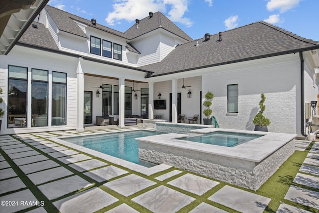 exterior space with a patio, an in ground hot tub, and ceiling fan