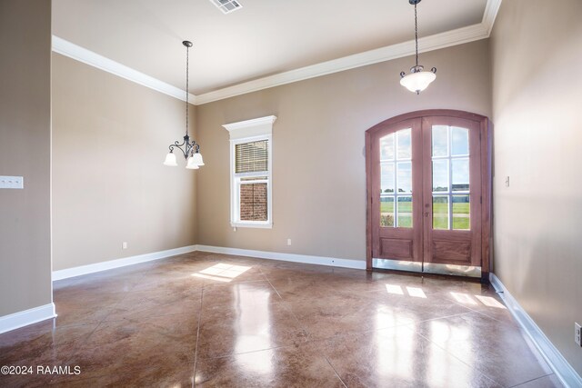 entrance foyer featuring french doors, a notable chandelier, and ornamental molding