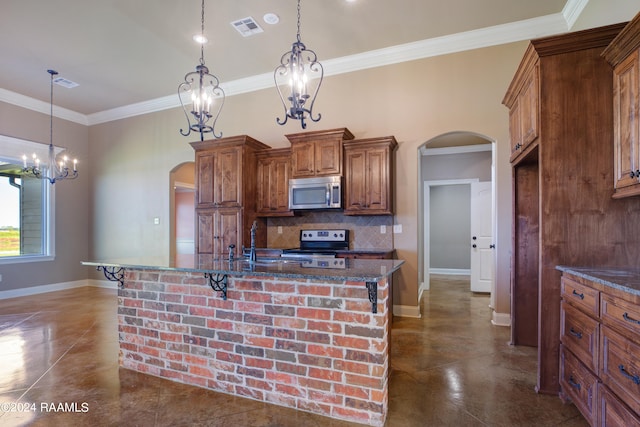 kitchen with hanging light fixtures, a kitchen bar, an inviting chandelier, and range with electric cooktop