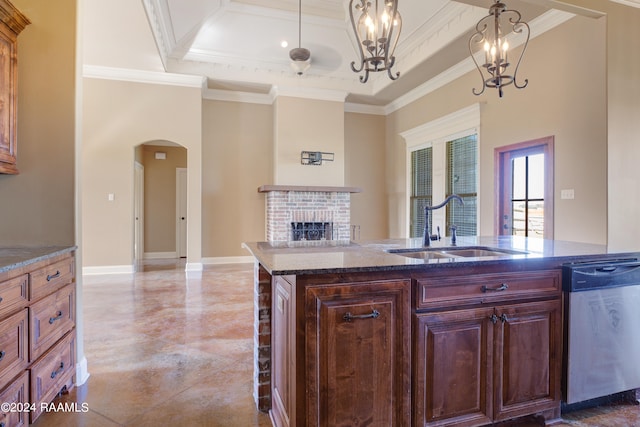 kitchen featuring a towering ceiling, an inviting chandelier, stainless steel dishwasher, ornamental molding, and sink