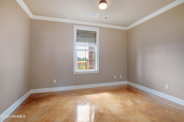 spare room featuring ceiling fan and ornamental molding