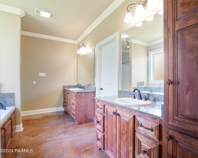 bathroom featuring a tub to relax in, ornamental molding, and vanity