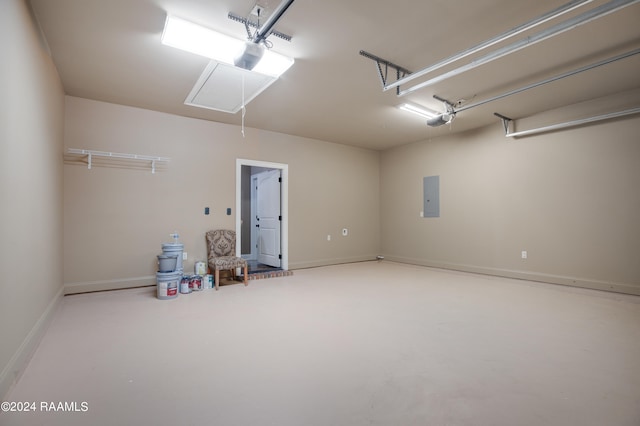 garage featuring a garage door opener and electric panel