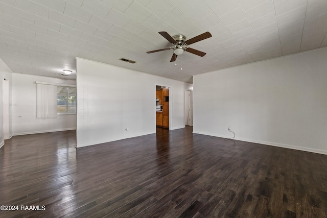 interior space with ceiling fan and dark wood-type flooring