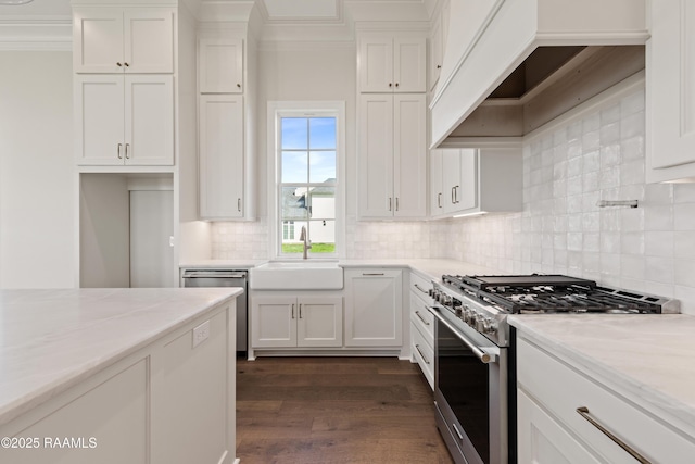 kitchen featuring a sink, white cabinets, and appliances with stainless steel finishes