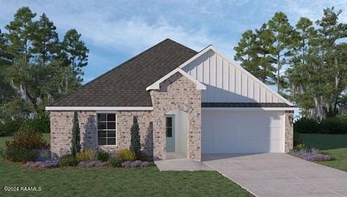 view of front of house with a front lawn and a garage