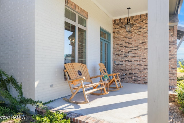 view of patio featuring a porch