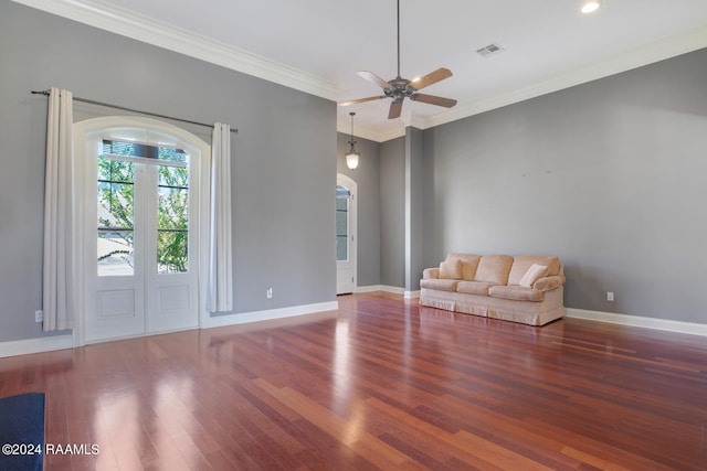 interior space with crown molding, dark hardwood / wood-style flooring, and ceiling fan