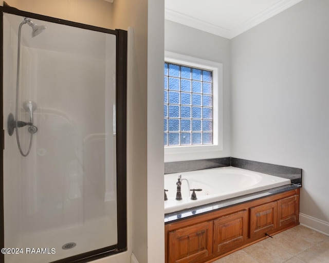 bathroom featuring shower with separate bathtub, crown molding, and tile patterned flooring