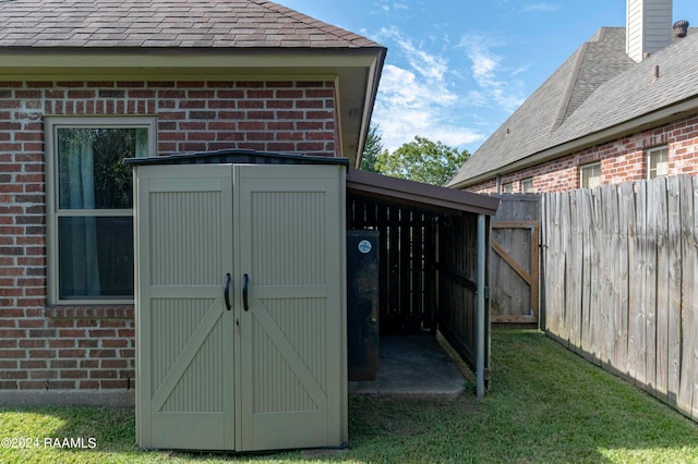 view of outdoor structure with a lawn