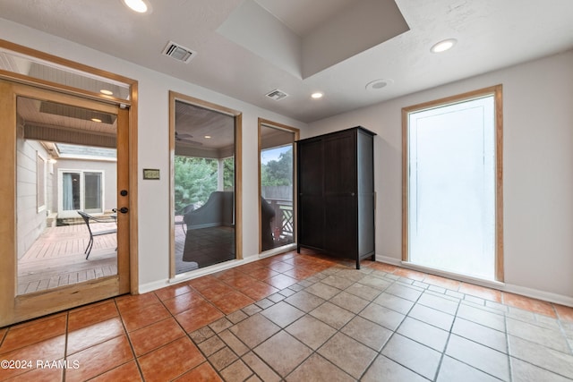 entrance foyer featuring tile patterned flooring