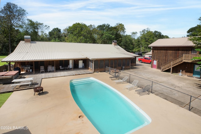 view of swimming pool with a patio