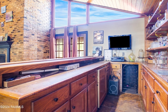 bar with wood ceiling and brick wall