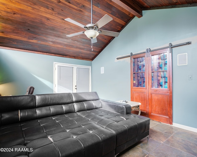 living room with lofted ceiling with beams, wood ceiling, ceiling fan, and a barn door