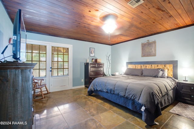 bedroom with french doors, wood ceiling, and ornamental molding