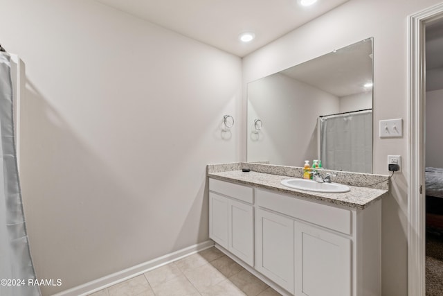 bathroom with vanity and tile patterned floors