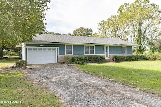 14311 William Rd, Kaplan, LA 70548 - single story home featuring driveway, a garage, and a front lawn