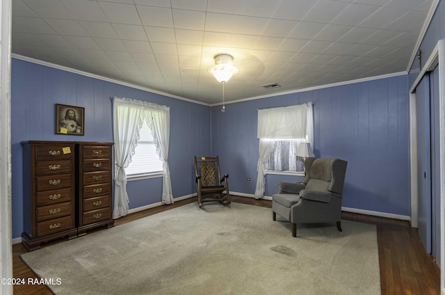 14311 William Rd, Kaplan, LA 70548 - sitting room with visible vents, ornamental molding, baseboards, and wood finished floors
