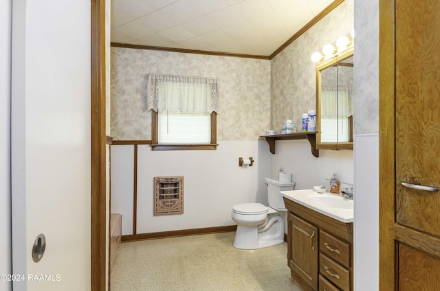 14311 William Rd, Kaplan, LA 70548 - bathroom featuring vanity, wallpapered walls, ornamental molding, toilet, and heating unit