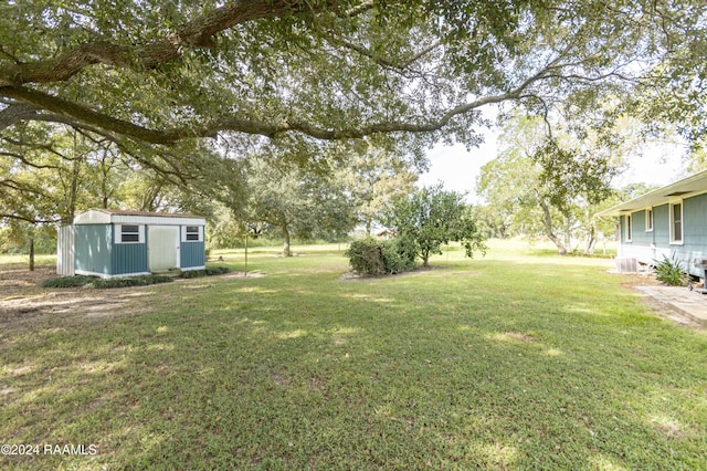 14311 William Rd, Kaplan, LA 70548 - view of yard with an outdoor structure and a shed