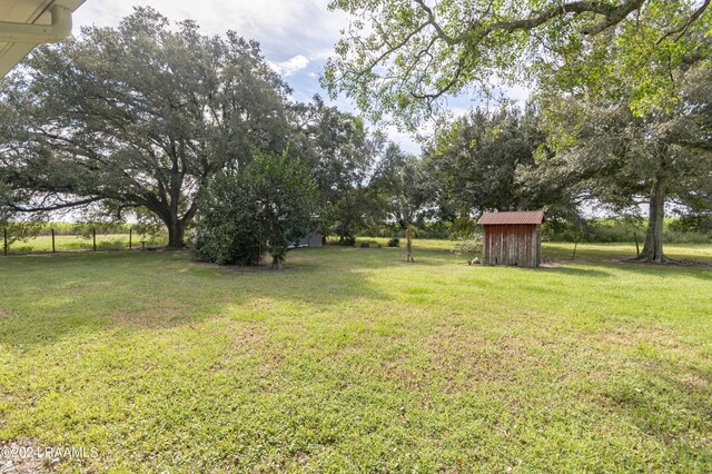 14311 William Rd, Kaplan, LA 70548 - view of yard with an outbuilding and a storage unit