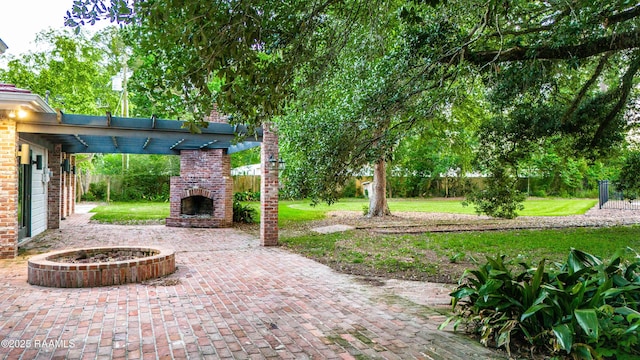 2862 S Union St, Opelousas, LA 70570 - view of patio with an outdoor brick fireplace