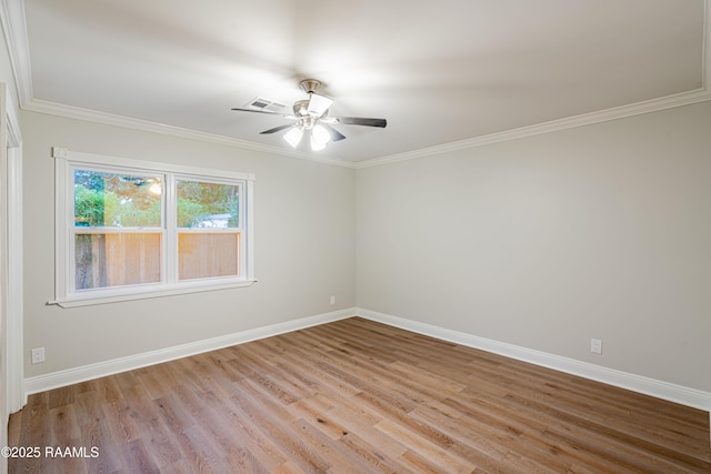 2862 S Union St, Opelousas, LA 70570 - empty room with light wood-style floors, baseboards, ceiling fan, and crown molding