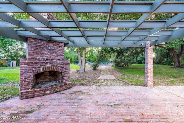 2862 S Union St, Opelousas, LA 70570 - view of patio featuring an outdoor brick fireplace and a pergola