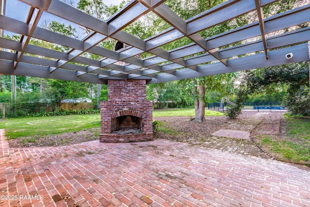 2862 S Union St, Opelousas, LA 70570 - view of patio / terrace with an outdoor brick fireplace and a pergola