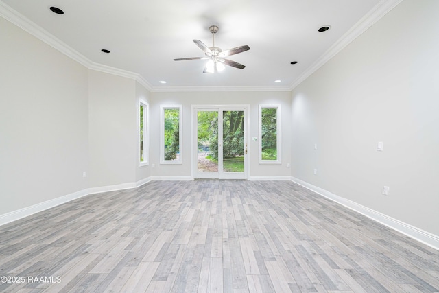 2862 S Union St, Opelousas, LA 70570 - spare room featuring light wood-style floors, ceiling fan, baseboards, and crown molding