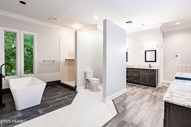 2862 S Union St, Opelousas, LA 70570 - full bath featuring vanity, ornamental molding, baseboards, recessed lighting, and a tile shower