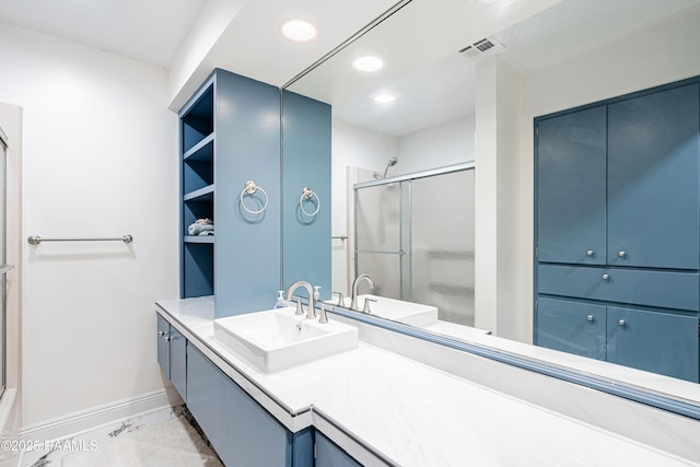 2862 S Union St, Opelousas, LA 70570 - full bath featuring baseboards, a shower with door, recessed lighting, vanity, and marble finish floors