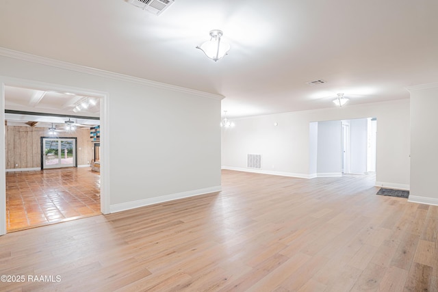 2862 S Union St, Opelousas, LA 70570 - unfurnished living room with baseboards, ornamental molding, light wood-style flooring, and ceiling fan