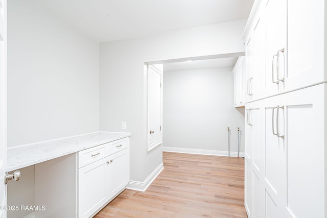 2862 S Union St, Opelousas, LA 70570 - washroom with light wood-type flooring and baseboards