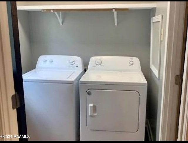 laundry area featuring washing machine and dryer