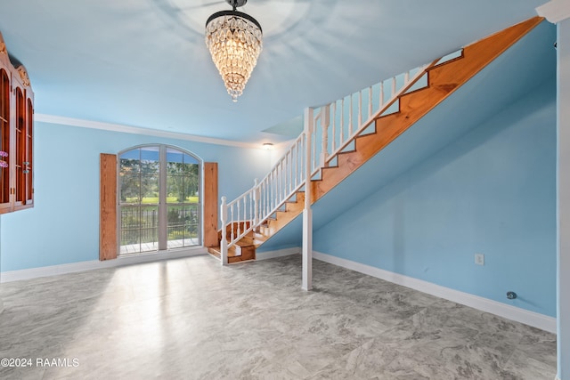 unfurnished living room with an inviting chandelier and crown molding