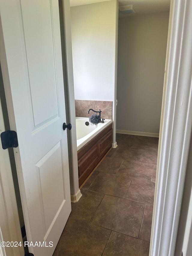 bathroom featuring a tub