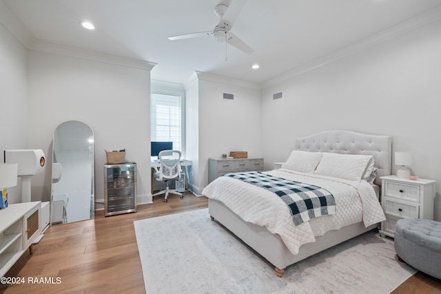 bedroom with wood-type flooring, ornamental molding, beverage cooler, and ceiling fan