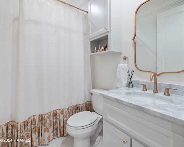 bathroom with tile patterned flooring, vanity, toilet, and a shower with shower curtain