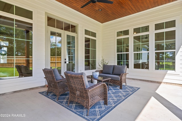 view of patio featuring an outdoor hangout area and ceiling fan