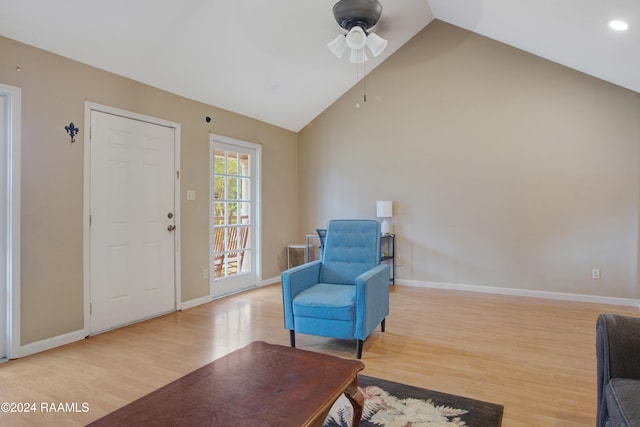 sitting room featuring light hardwood / wood-style flooring, ceiling fan, and high vaulted ceiling