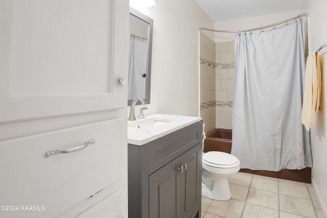 full bathroom with shower / bath combination with curtain, tile patterned floors, vanity, and toilet