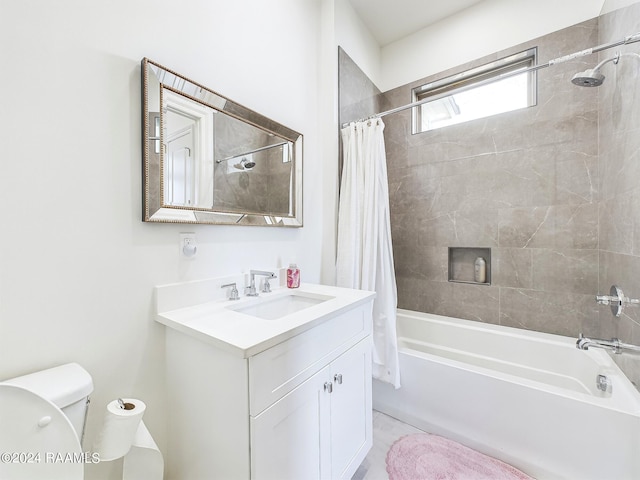 full bathroom with toilet, tile patterned flooring, vanity, and shower / tub combo