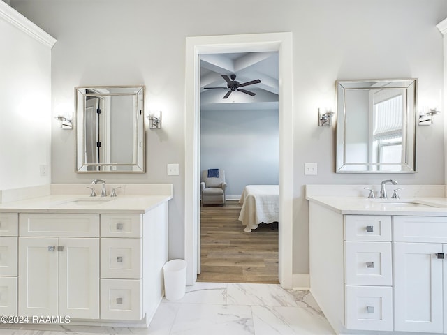 bathroom with beamed ceiling, vanity, coffered ceiling, and ceiling fan