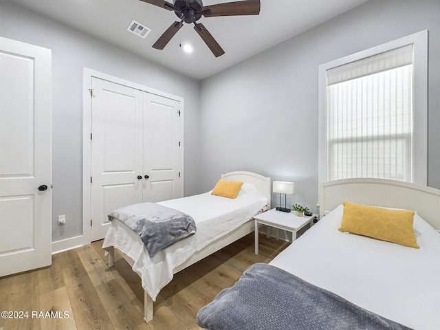 102 Blue Harbor Ln, Lafayette, LA 70503 - bedroom with wood finished floors, a closet, ceiling fan, recessed lighting, and baseboards