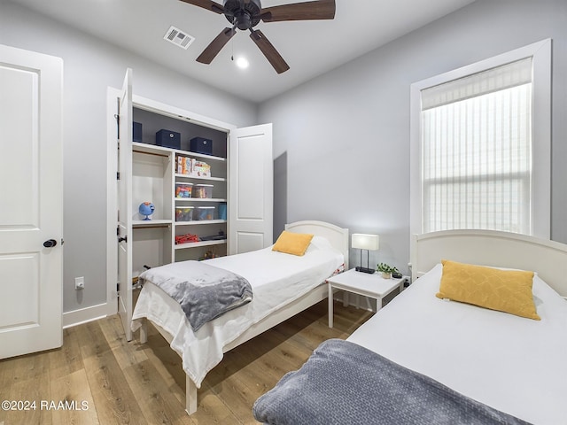 102 Blue Harbor Ln, Lafayette, LA 70503 - bedroom with wood finished floors and ceiling fan