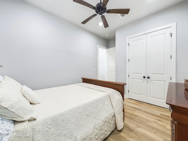 102 Blue Harbor Ln, Lafayette, LA 70503 - bedroom featuring light wood finished floors, a closet, recessed lighting, and a ceiling fan