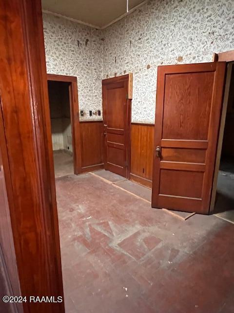 414 E Main St, Ville Platte, LA 70586 - interior space with wainscoting and wooden walls