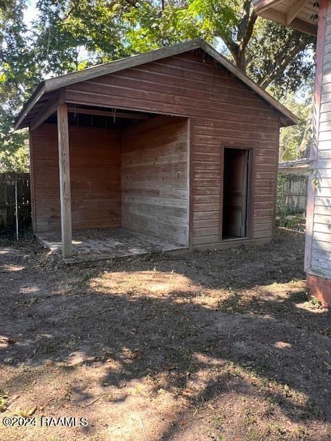 414 E Main St, Ville Platte, LA 70586 - view of outbuilding with fence and an outbuilding