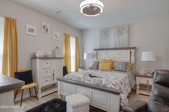 bedroom featuring light hardwood / wood-style floors